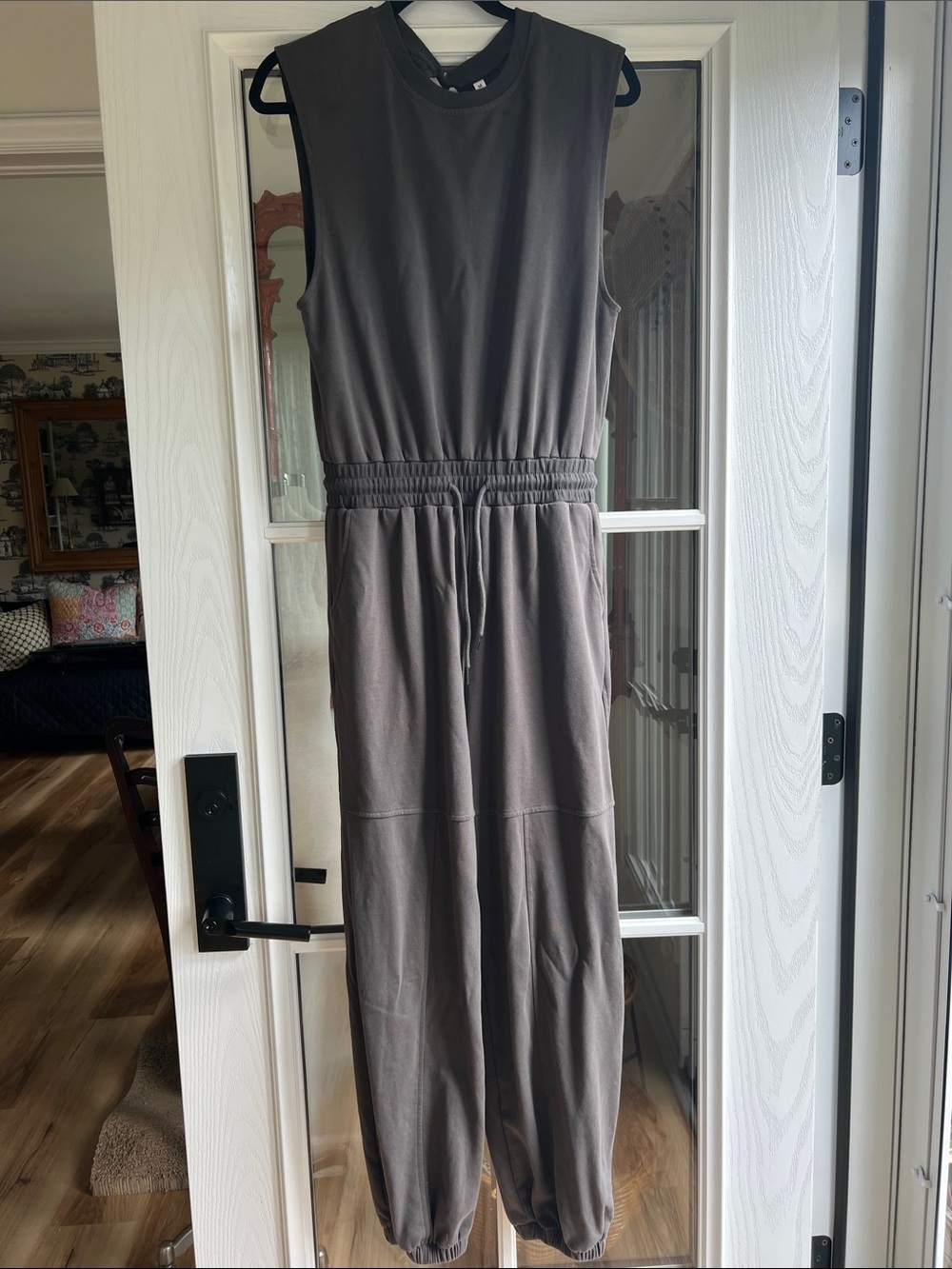 Army Green Khaki Jumpsuit with open back and elastic Hem size M